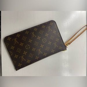 Authentic Louis Vuitton bag with wrist strap (NEVER USED)